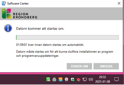 Gråvit ruta med regionlogga och texten "Datorn kommer att startas om. 01:59:01 kvar innan datorn startas om automatiskt. Datorn måste startas om för att kunna slutföra installationen av program och programvaruuppdateringar."