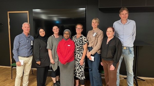 Gruppbild på personal som var på plats vid vaccinationsdialogen.